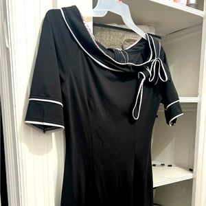 Black Evening dress with white pipe trimming.